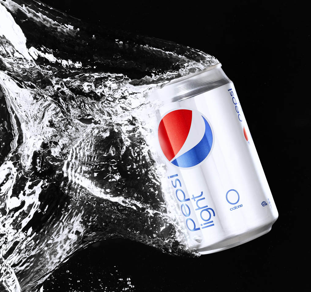 A Can of Pepsi Light dropped in water
